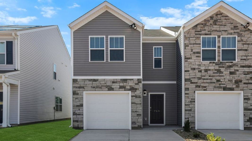Front exterior of a new home in Covington Village, Greer, SC, highlighting curb appeal (Image 1). Front exterior of a new home in Covington Village, Greer, SC, highlighting curb appeal (Image 1).