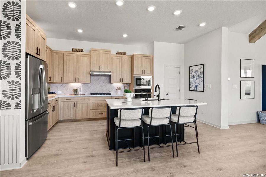 Furnished interior view inside a new home in Stream Waters, Seguin (Image 10).