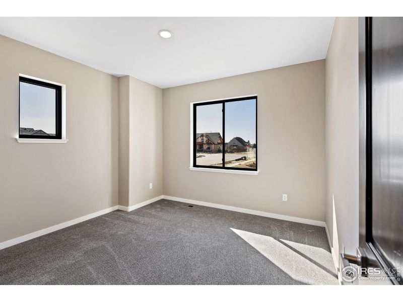 Spacious, unfurnished interior of a new home in Harvest Ridge, Berthoud (Image 24).