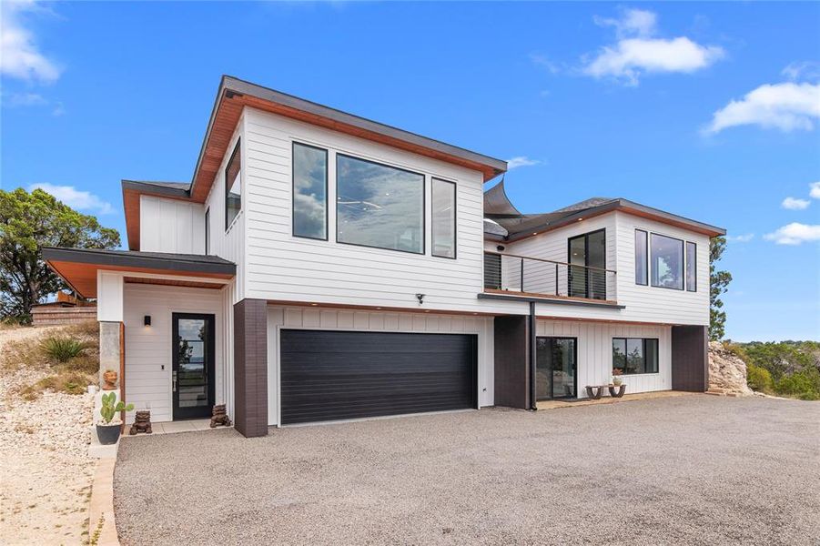 Front of the house. Front Door (left), Garage, Private enterance to seperate full living quaters,