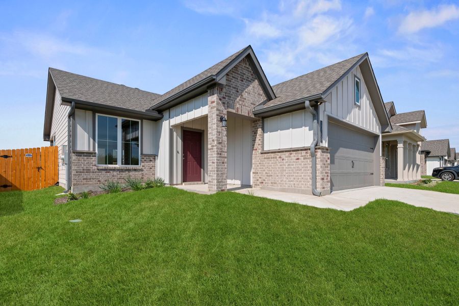 Front exterior of a new home in Eagles Landing, Waco, TX, highlighting curb appeal (Image 2). Front exterior of a new home in Eagles Landing, Waco, TX, highlighting curb appeal (Image 2).