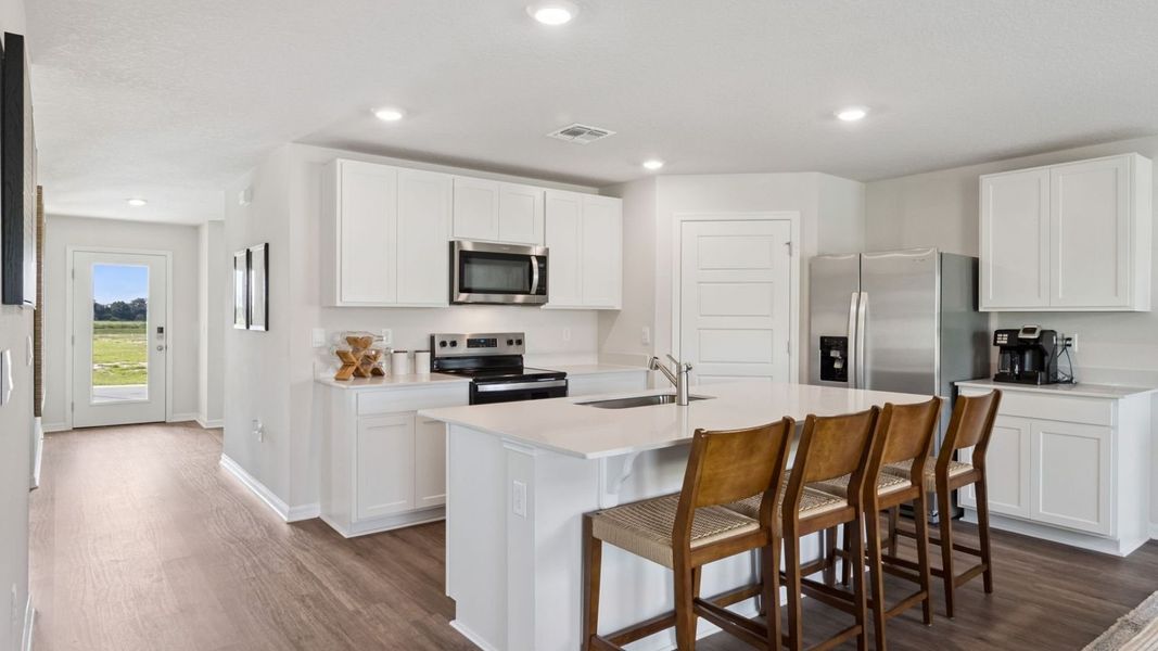 Representative furnished interior of a home built from the Archer II by D.R. Horton in Poinciana Enclave, Poinciana (Image 5).