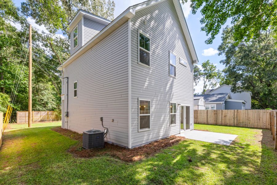 Exterior details and patio area of a home in , Charleston (Image 31).