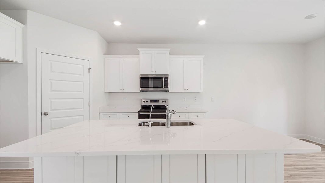 Representative furnished interior of a home built from the Carol by D.R. Horton in Bayside at Ward Creek, Panama City Beach (Image 12). Representative furnished interior of a home built from the Carol by D.R. Horton in Bayside at Ward Creek, Panama City Beach (Image 12).