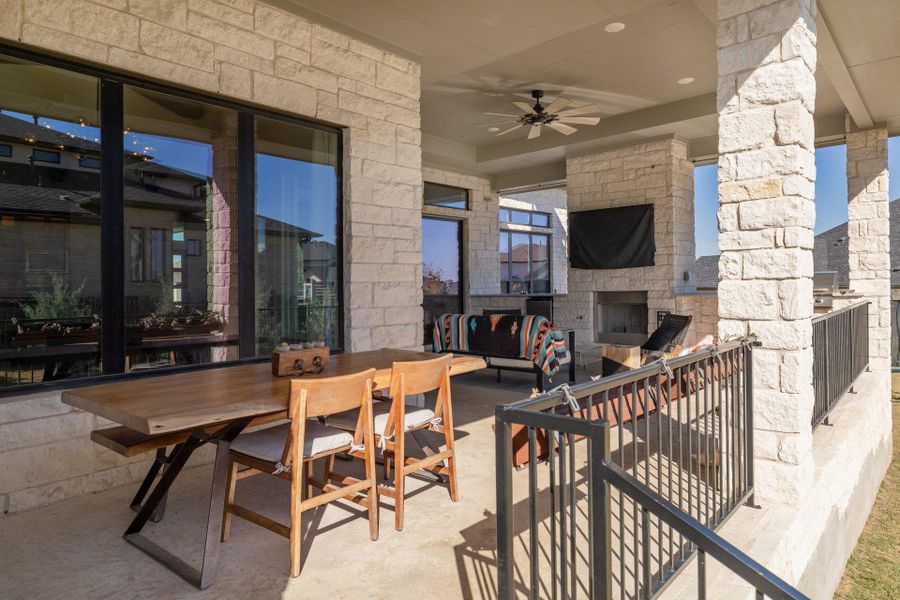 The outdoor kitchen and covered patio create an ideal setting for entertaining and al fresco dining.
