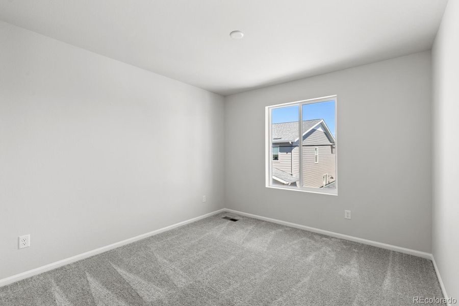 Spacious, unfurnished interior of a new home in The Villas Collection at Sterling Ranch, Littleton (Image 32).