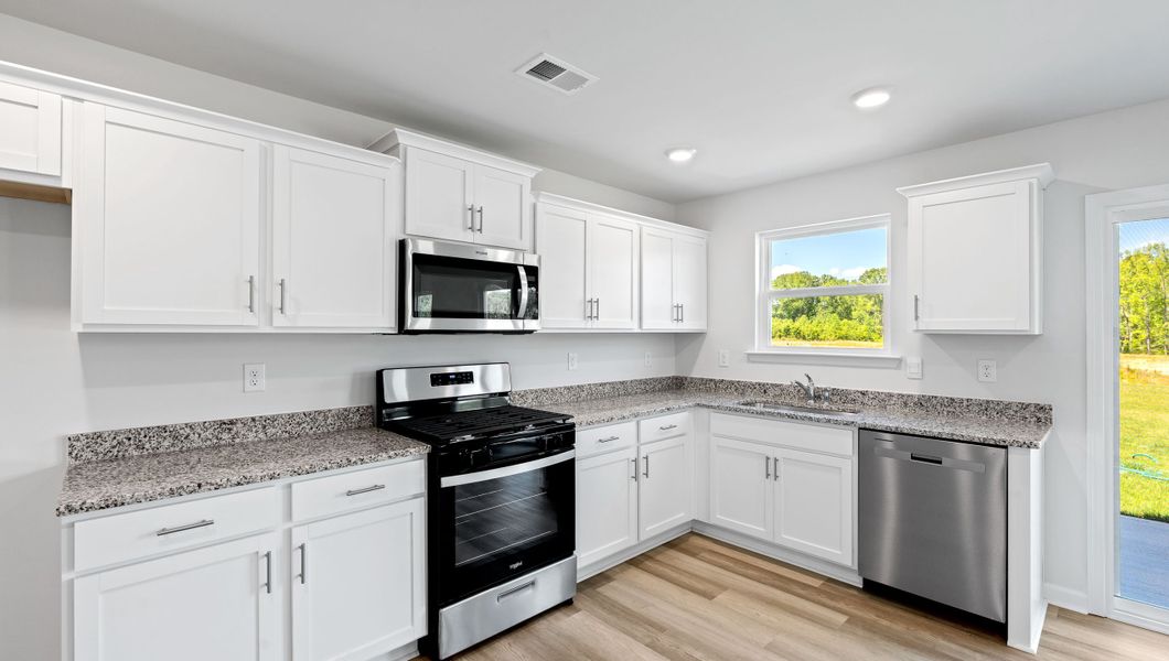 Representative furnished interior of a home built from the TAYLOR by D.R. Horton in Stone Creek, Clinton (Image 9).