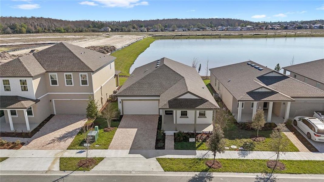 Front exterior of a new home in , Kissimmee, FL, highlighting curb appeal (Image 18).
