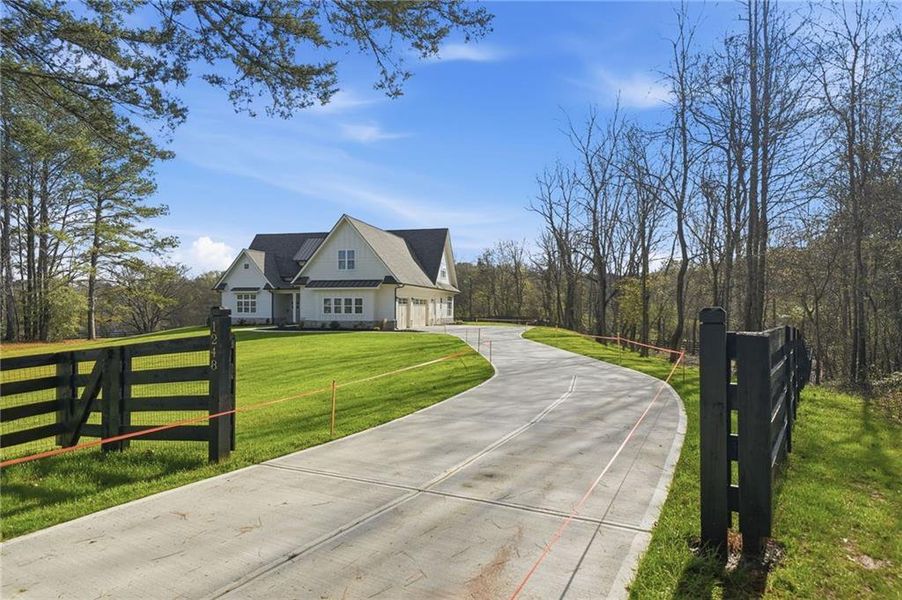 Front exterior of a new home in , Canton, GA, highlighting curb appeal (Image 32).