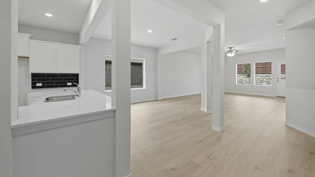 Representative unfurnished interior of a home built from the Tanzanite by D.R. Horton in Silverado, Aubrey (Image 10).