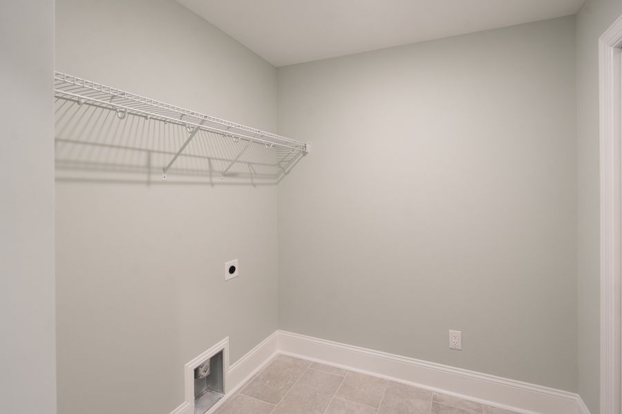 Representative unfurnished interior of a home built from the Shoreline by Bill Clark Homes in Osprey Landing, Southport (Image 22).