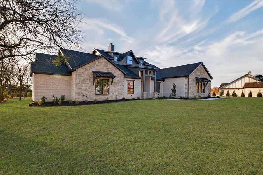 Front exterior of a new home in , Farmersville, TX, highlighting curb appeal (Image 26). Front exterior of a new home in , Farmersville, TX, highlighting curb appeal (Image 26).