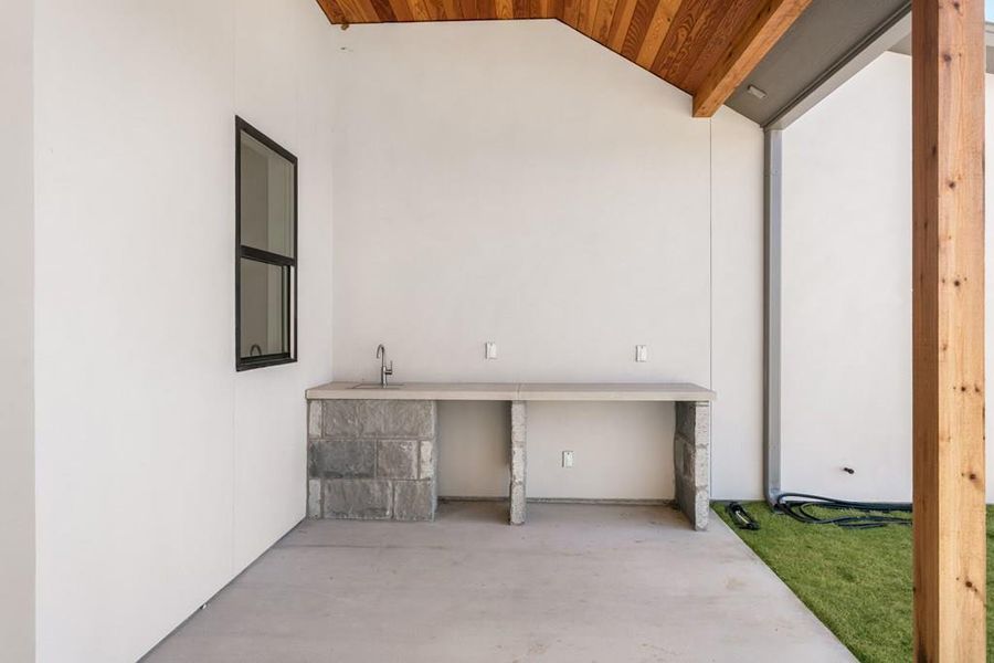 View of patio / terrace featuring a sink View of patio / terrace featuring a sink