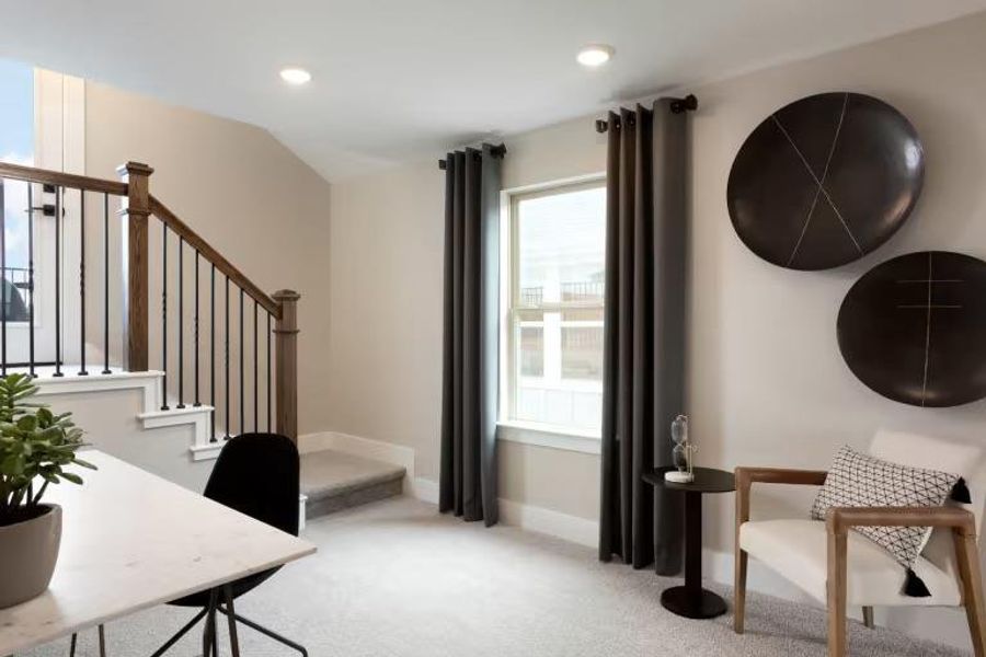 Photo of Pulte model home with same floor plan, not of actual home listed. Photo of Pulte model home with same floor plan, not of actual home listed.