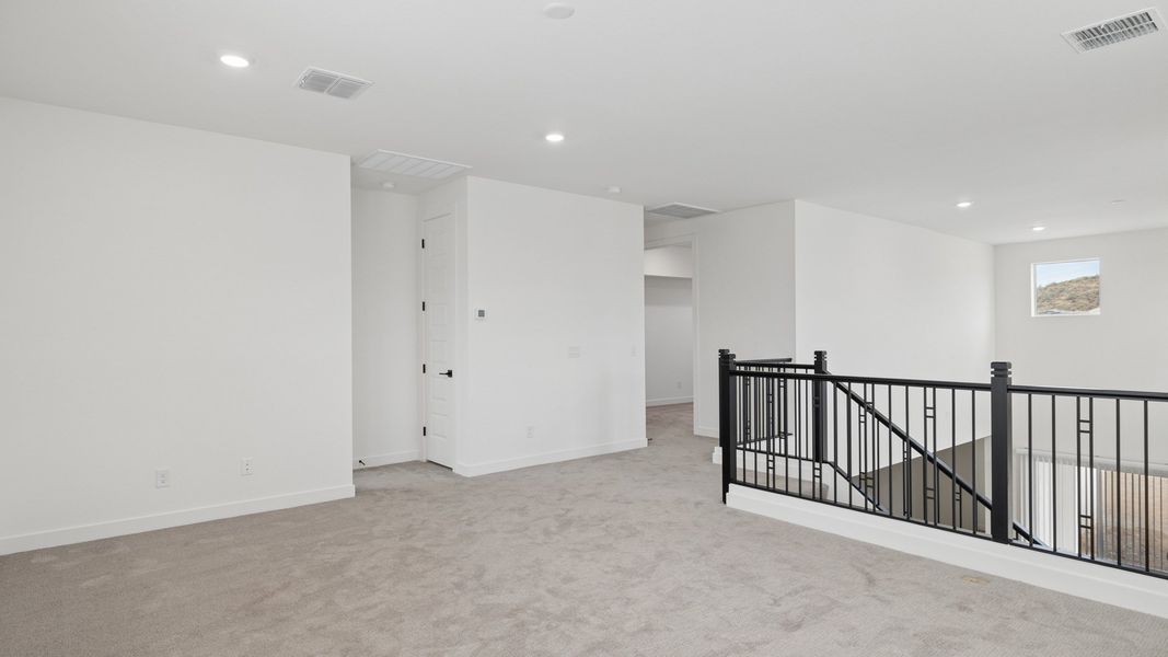 Representative unfurnished interior of a home built from the Phoenician by D.R. Horton in The Ridge at Stone Butte, Phoenix (Image 30).