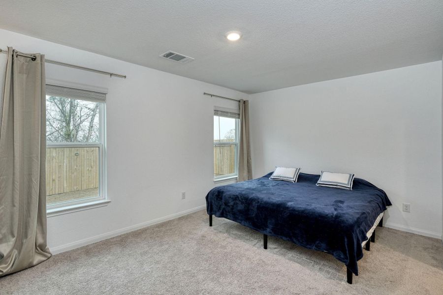 Primary Bedroom showing both windows.