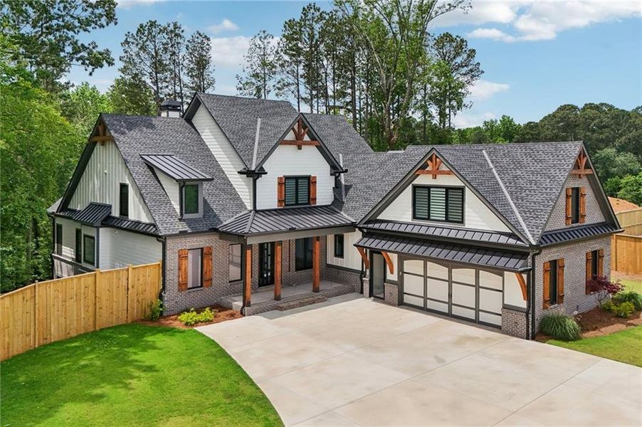 Front exterior of a new home in , Cumming, GA, highlighting curb appeal (Image 31). Front exterior of a new home in , Cumming, GA, highlighting curb appeal (Image 31).