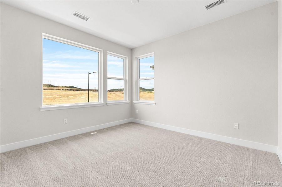 Spacious, unfurnished interior of a new home in Storytellers at Lyric, Lone Tree (Image 21).