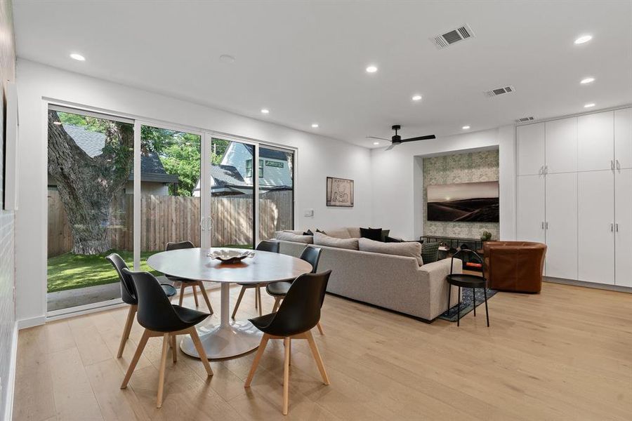 The dining area looks out onto the low maintenance backyard.