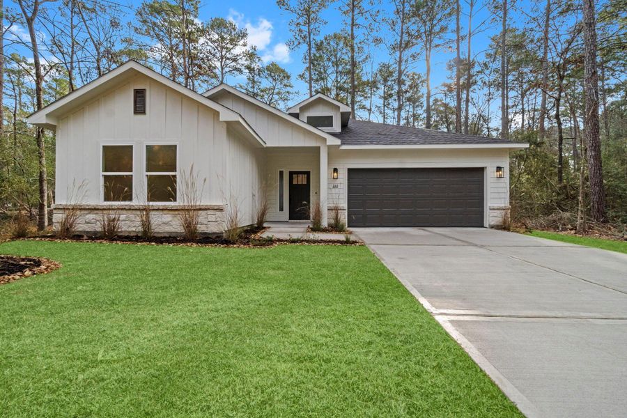 Front exterior of a new home in , Trinity, TX, highlighting curb appeal (Image 24).