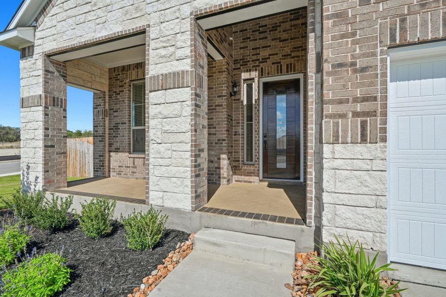 Exterior details and patio area of a home in Alsatian Oaks, Castroville (Image 4).