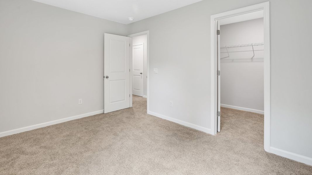 Spacious, unfurnished interior of a new home in Saltgrass Landing, Winnabow (Image 32).