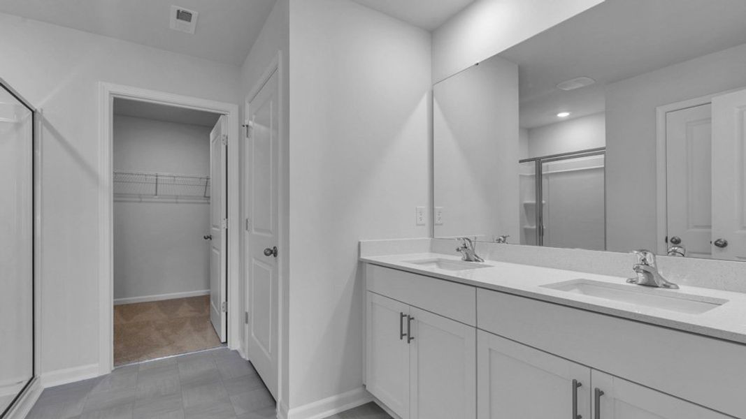 Furnished interior view inside a new home in The Preserve at Kinsley, Jamestown (Image 9).