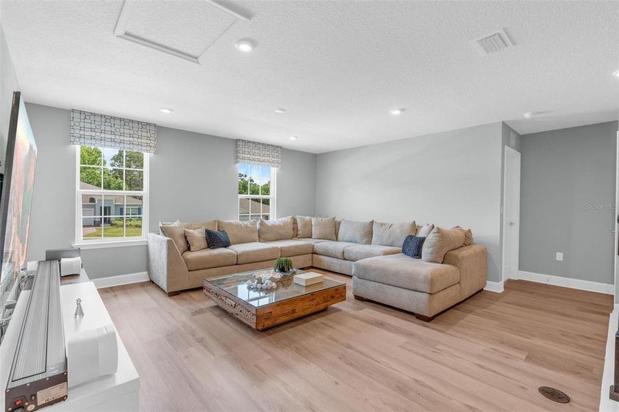 Furnished interior view inside a new home in Bella Terra, Clermont (Image 47).