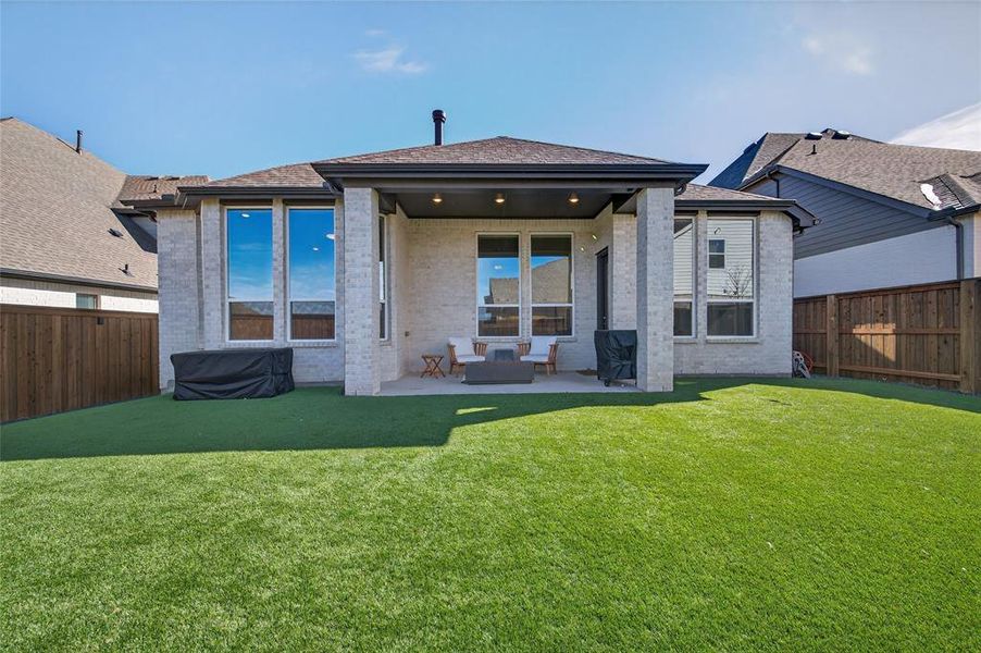 The turf in the backyard keeps things green year round!