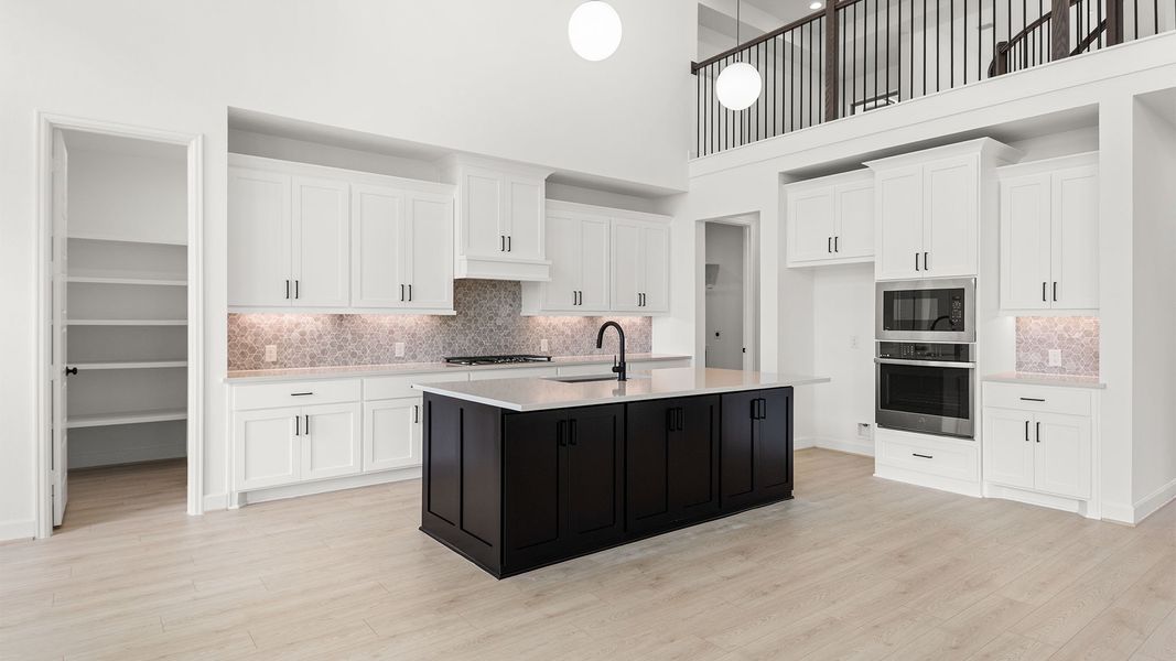 Furnished interior view inside a new home in Lakes of Cane Island, Katy (Image 6).