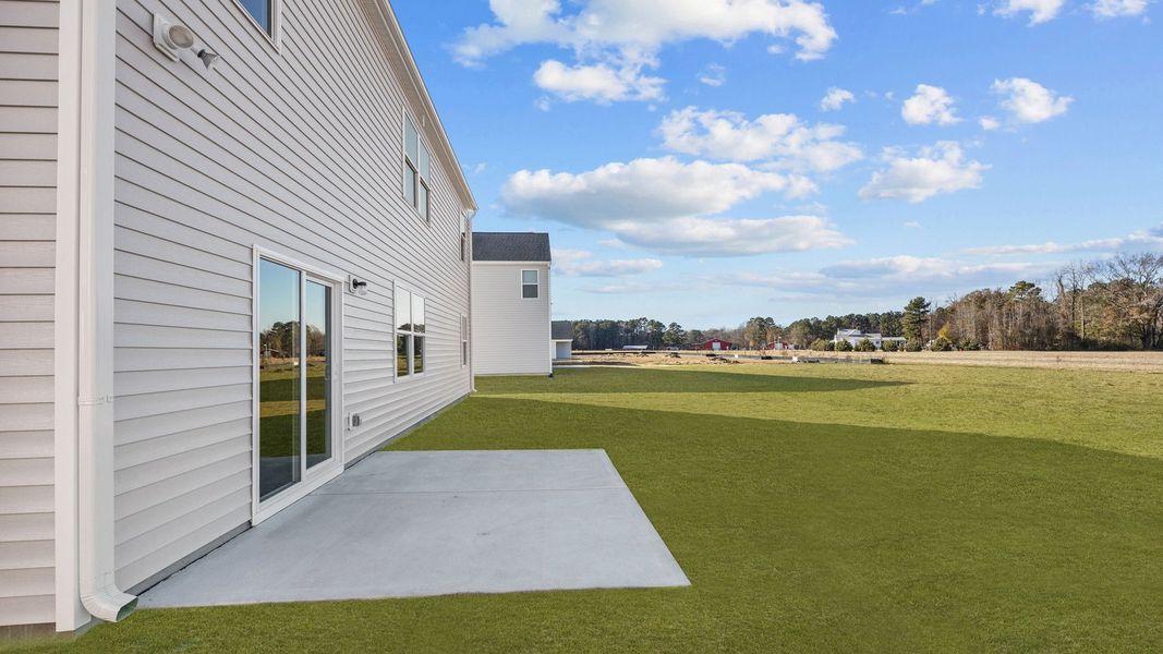 Exterior details and patio area of a home in West New Bern, New Bern (Image 4).