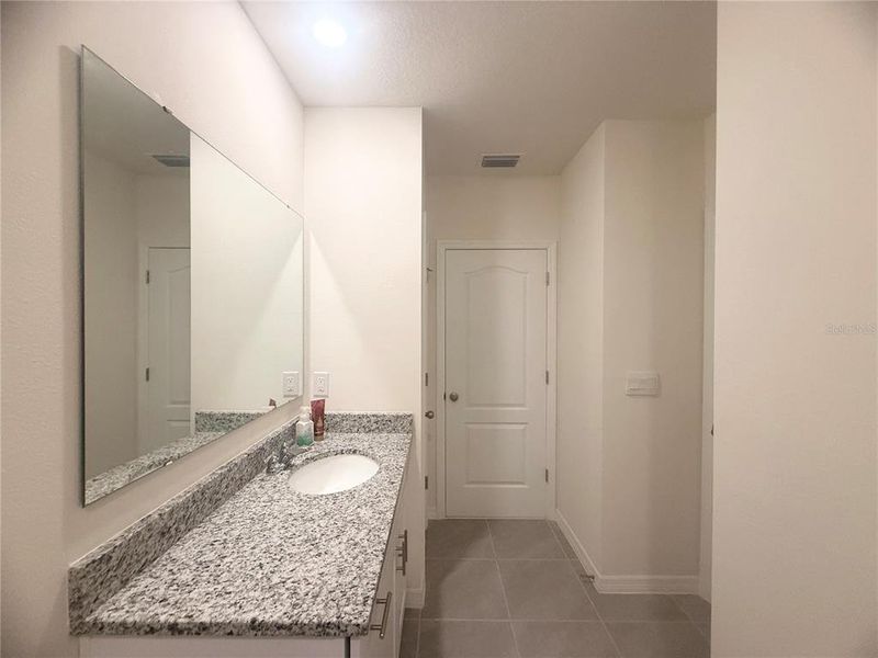 Furnished interior view inside a new home in , Kissimmee (Image 25).