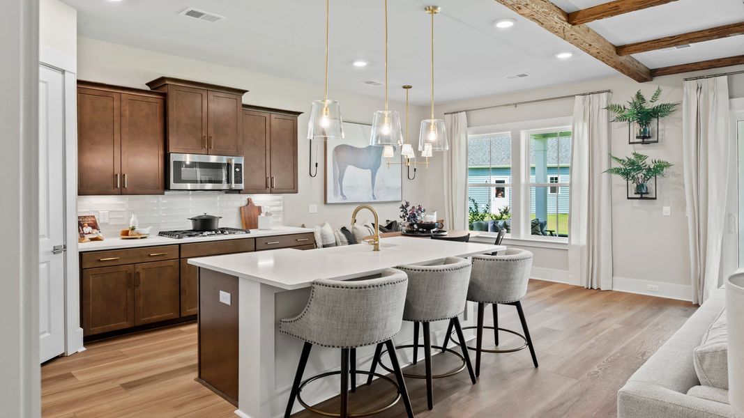 Representative furnished interior of a home built from the Traveler by DRB Elevate. in Summerwind Crossing at Lakes of Cane Bay, Summerville (Image 9).