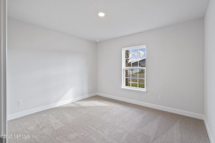 Spacious, unfurnished interior of a new home in Shadow Crest at Rolling Hills, Green Cove Springs (Image 13).