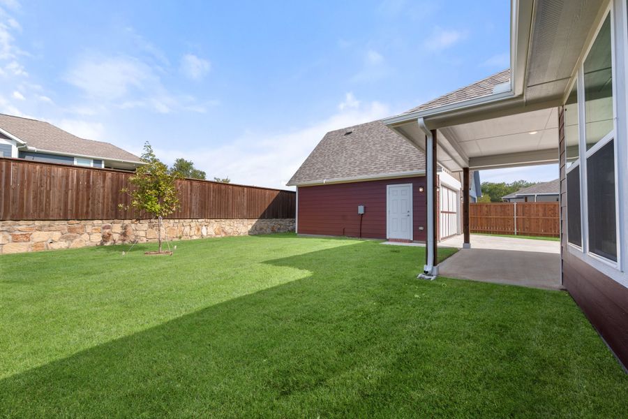 Exterior details and patio area of a home in Heritage Towne, Midlothian (Image 30). Exterior details and patio area of a home in Heritage Towne, Midlothian (Image 30).