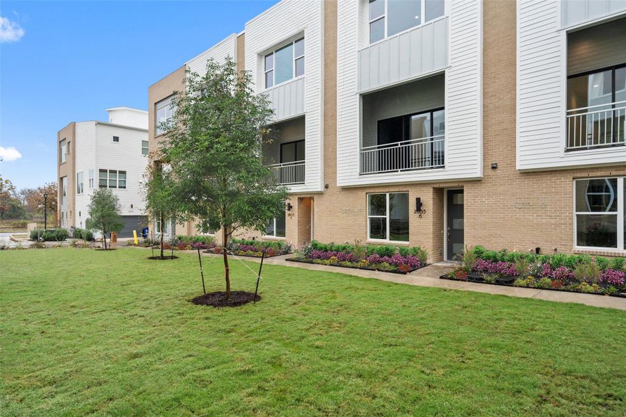 Exterior details and patio area of a home in Austin Modern Lofts at Mueller, Austin (Image 23).