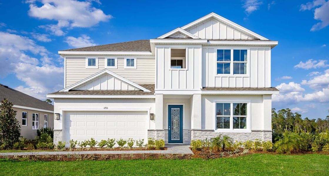 Representative exterior photo of a completed home built from the Alexandria II by Risewell Homes in St. Johns Preserve, Palm Bay, FL (Image 17).