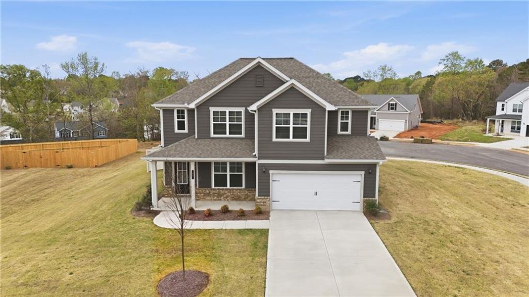 Front exterior of a new home in , Commerce, GA, highlighting curb appeal (Image 26).