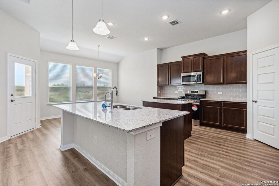 Furnished interior view inside a new home in Lonesome Dove, San Antonio (Image 13).