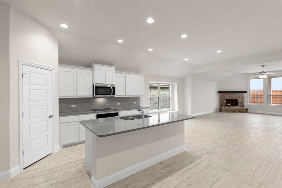 Representative exterior photo of a completed home built from the Kingston by Impression Homes in Timberbrook, Justin, TX (Image 9).