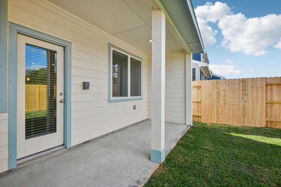 Exterior details and patio area of a home in Kemah Crossing - City Series, Kemah (Image 3).