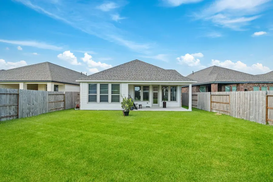 Front exterior of a new home in Marvida 45', Cypress, TX, highlighting curb appeal (Image 23). Front exterior of a new home in Marvida 45', Cypress, TX, highlighting curb appeal (Image 23).