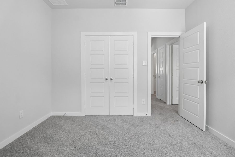 Bedroom in the Masters home plan by Trophy Signature Homes