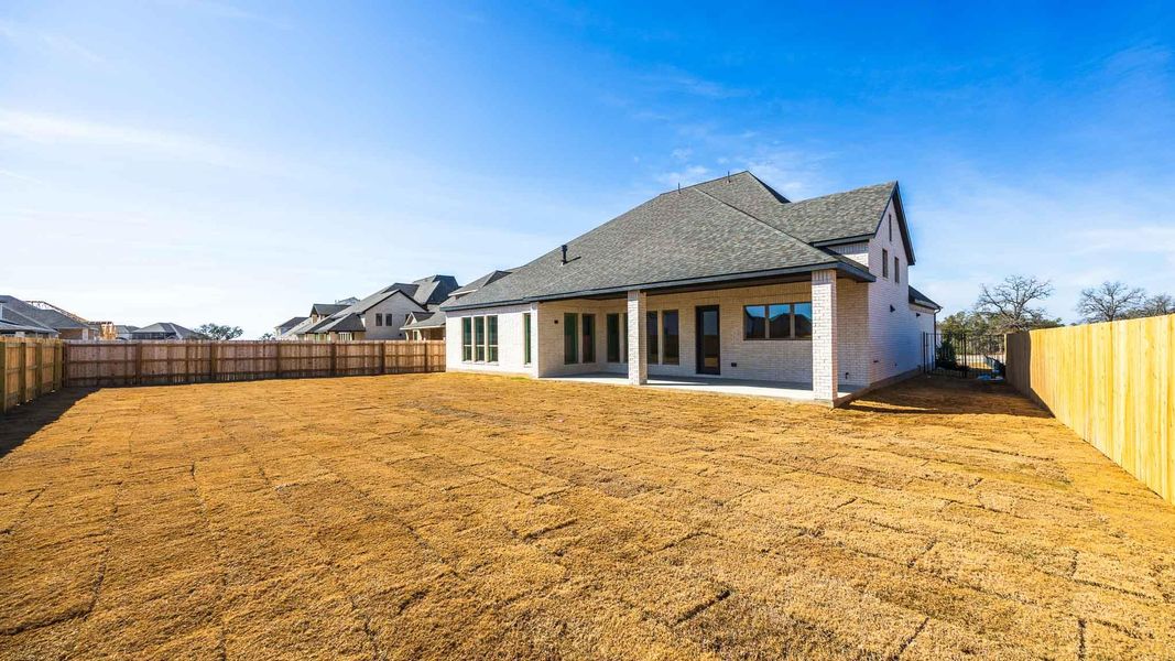 Exterior details and patio area of a home in Santa Rita Ranch - Eldorado, Liberty Hill (Image 3).