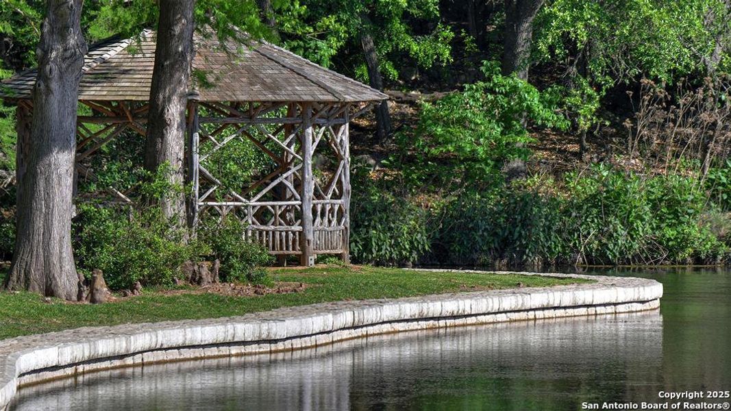 Front exterior of a new home in Veramendi 60', New Braunfels, TX, highlighting curb appeal (Image 27).