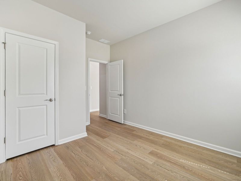 Spacious, unfurnished interior of a new home in River Glen, Angier (Image 16).