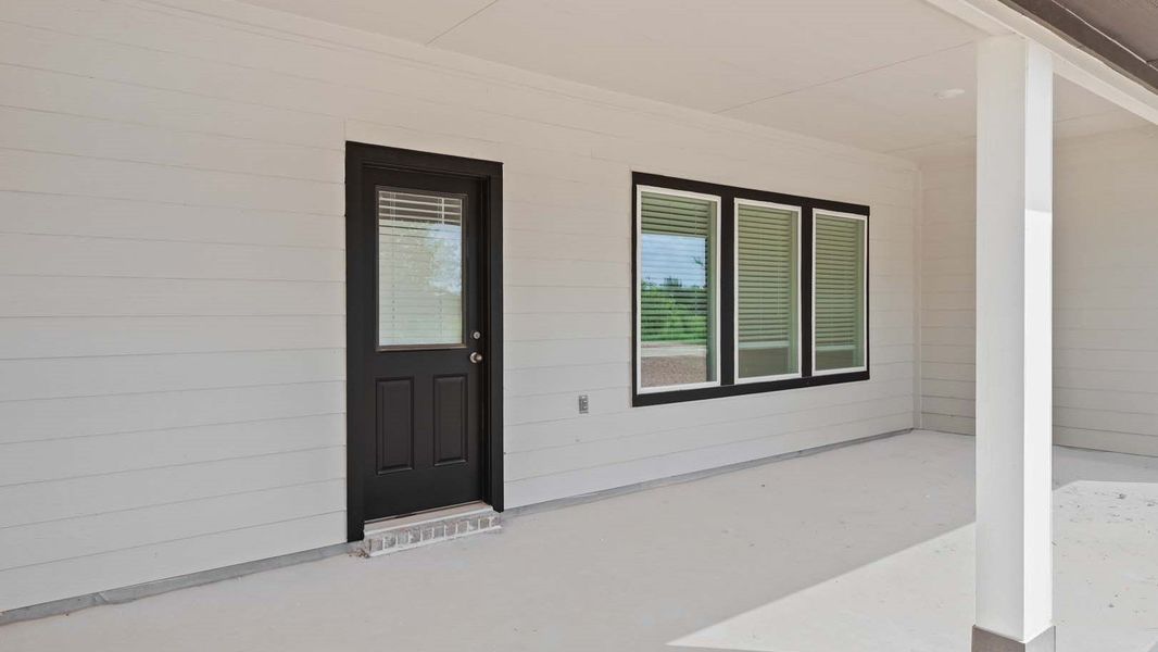 Exterior details and patio area of a home in Blue Heron Estates, Beasley (Image 2). Exterior details and patio area of a home in Blue Heron Estates, Beasley (Image 2).