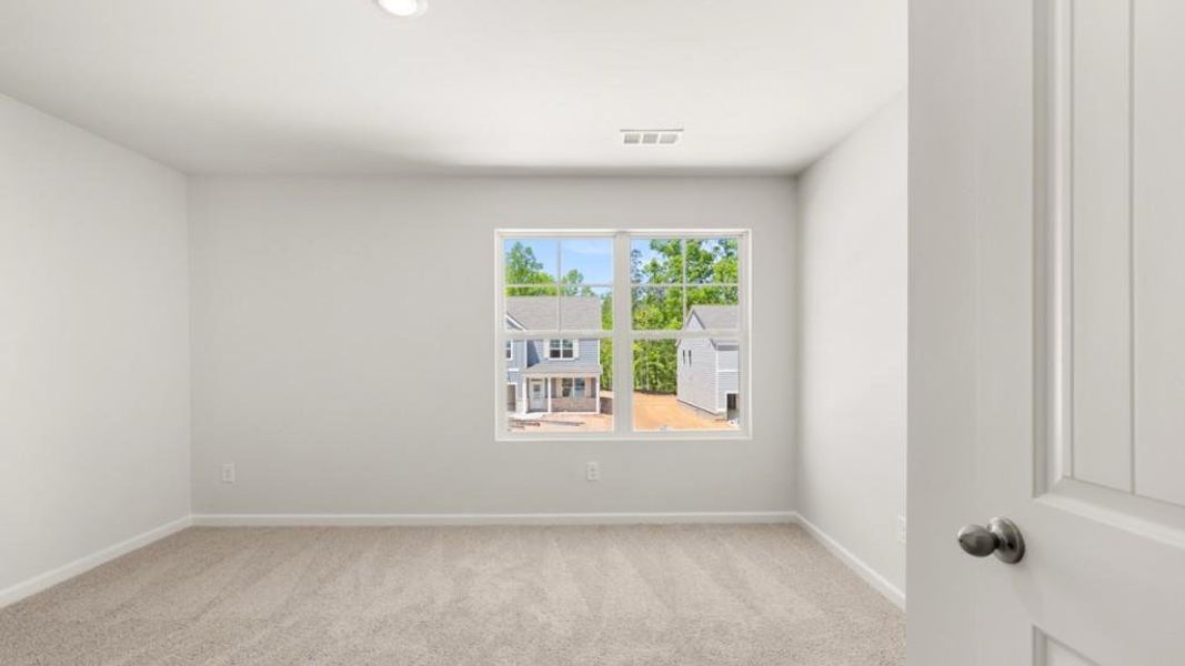Spacious, unfurnished interior of a new home in Parkside at Carter Grove, Cartersville (Image 23).