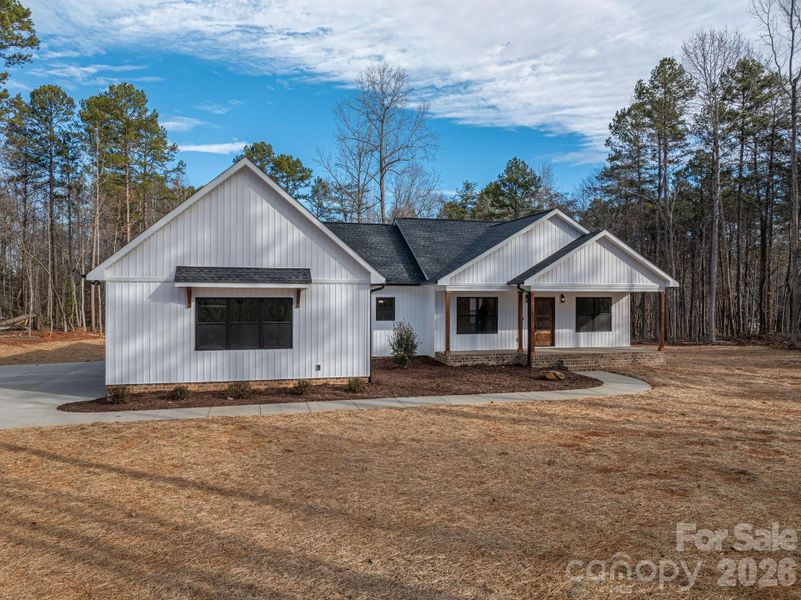 Front exterior of a new home in , Denver, NC, highlighting curb appeal (Image 20).