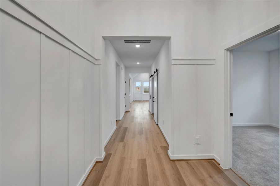 Inviting foyer with decorative feature wall